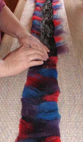 folding the wool onto the fabric