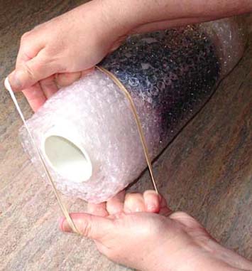 putting rubber bands on the roll